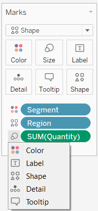 Marks card with shelves for Segment, Region, and Sum (Quantity). For the Sum (Quantity) measure, a context menu shows options for Color, Label, Shape, Detail, and Tooltip.